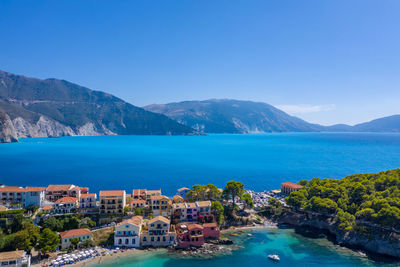 Scenic view of sea against blue sky