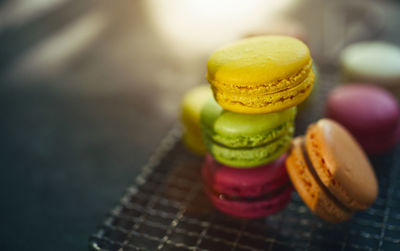 High angle view of colorful macaroons on table