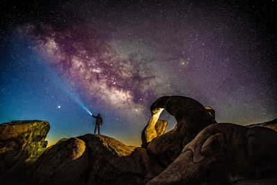 Milky way against arch in southern california 