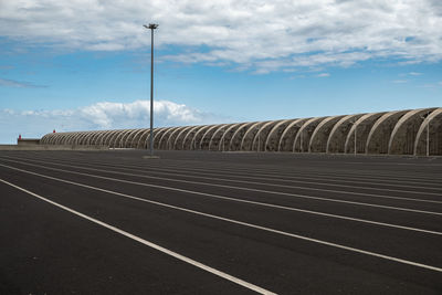 Empty road against sky