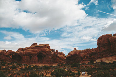 Rock formations on landscape against sky