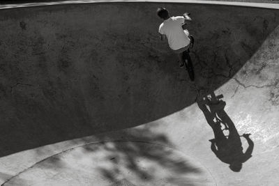 High angle view of man skateboarding on skateboard