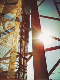 Low angle view of sunlight streaming through sun