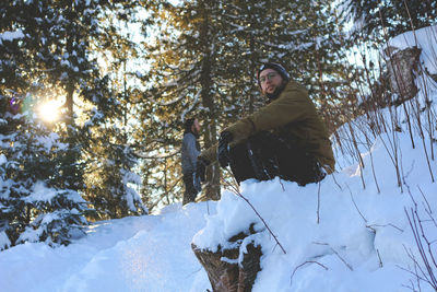 Men in snow covered landscape