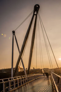 Suspension bridge at sunset