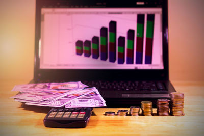 Close-up of coins on table