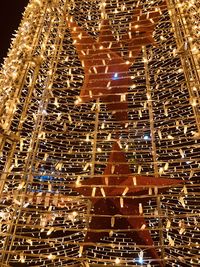 Low angle view of illuminated building at night