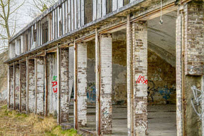 Red text on brick wall