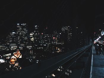 Illuminated city at night