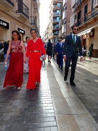 People walking on street in city