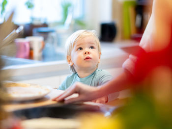 Portrait of cute baby girl at home