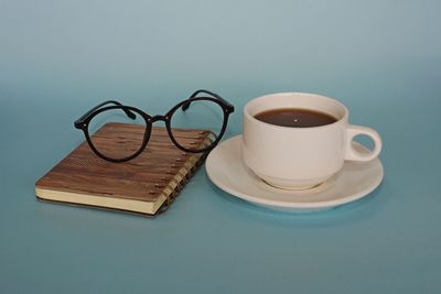 High angle view of coffee cup on table