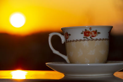 Close-up of coffee cup on table