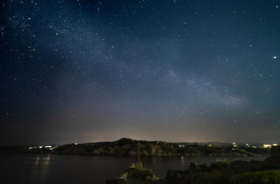 Scenic view of star field against sky at night