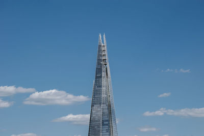 Low angle view of skyscraper against sky