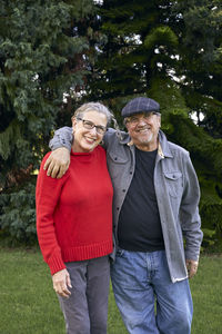 Older couple enjoying retirement walking in the park
