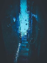 Close-up of water drops on glass