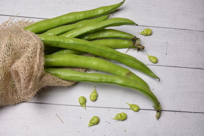 High angle view of green chili pepper on table