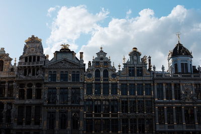 View of buildings against cloudy sky