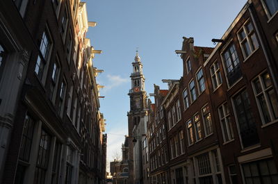 Low angle view of buildings against sky in city