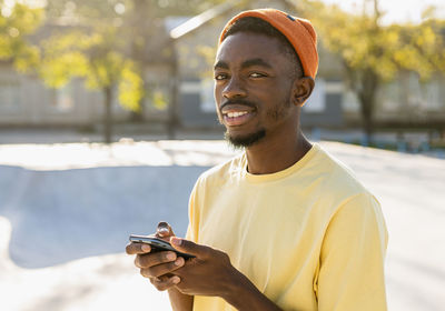 Young man using mobile phone