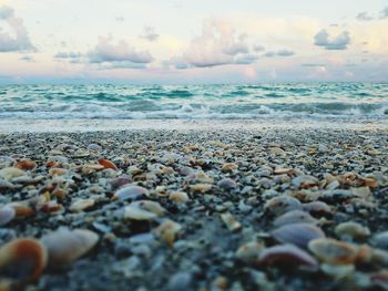 Scenic view of sea against cloudy sky