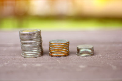 Stack of coins on table