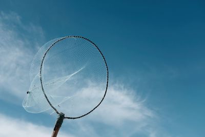 Low angle view of basketball hoop against sky