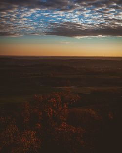 Scenic view of landscape against sky during sunset