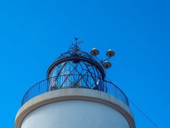 Low angle view of built structure against blue sky