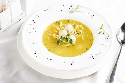 High angle view of soup in bowl on table