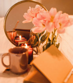 Close-up of pink flower on table