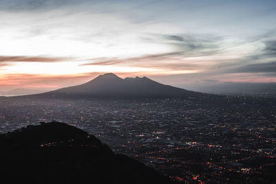 High angle view of cityscape against sky at sunset