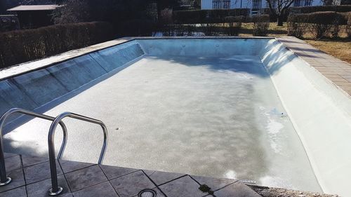 Swimming pool by modern building