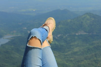 Low section of woman on mountain