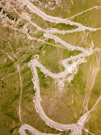 Winding and dangerous road from the high mountain pass in transalpina, romania