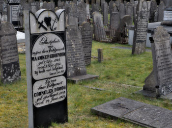 Text on stone at cemetery