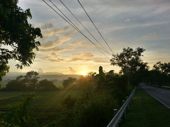 Scenic view of landscape at sunset