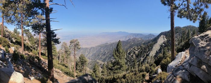 Panoramic view of mountains against clear sky