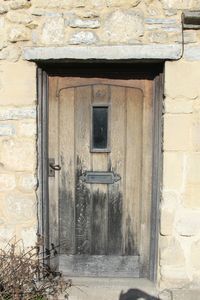 Brick wall with closed door