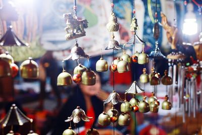 Close-up of wind chimes hanging for sale