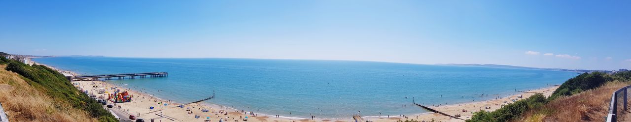 High angle view of sea against blue sky