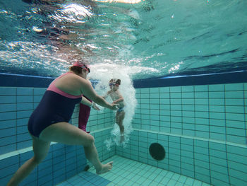 People swimming in pool