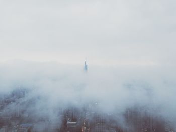 Aerial view of city buildings against sky