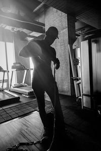 Man standing on floor at home