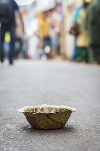 Dry leaves utensil plate waste put on street maket, pushkar, india