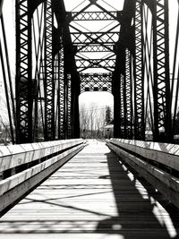 Surface level of footbridge along trees