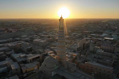 High angle view of city buildings during sunset