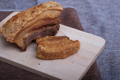 High angle view of bread on cutting board