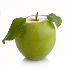 Close-up of apple against white background